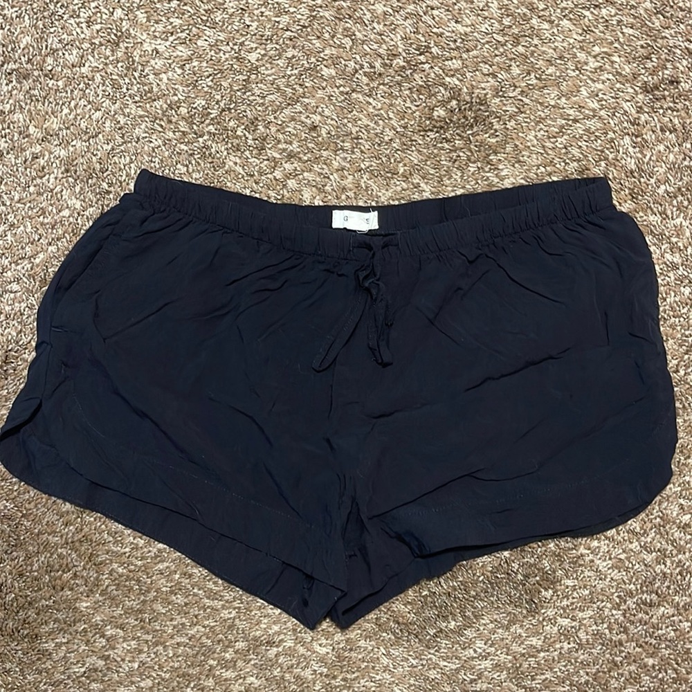 Garage all black tie shorts. Viscose material. Size medium.